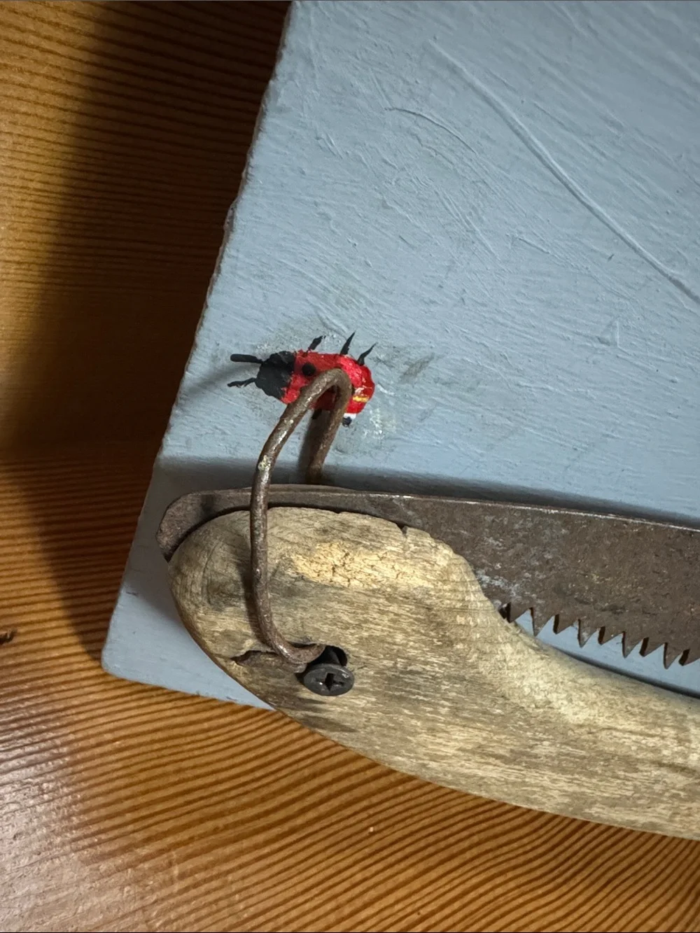 Rustic Redneck Wall Display with Reclaimed Saw & other metal items